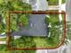 Aerial view of the property and surrounding landscape, highlighting the roof and neighborhood at 1701 Canton Street, Orlando, FL 32803