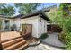 Charming backyard with a wooden deck and lush landscaping, perfect for outdoor enjoyment and relaxing at 1701 Canton Street, Orlando, FL 32803