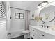 Bright bathroom featuring hex tile floors, subway tiled shower, and modern vanity at 1701 Canton Street, Orlando, FL 32803