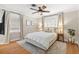A cozy primary bedroom with a neutral color scheme, plush rug, and ample natural light at 1701 Canton Street, Orlando, FL 32803