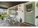 Inviting front porch, perfect for enjoying the outdoors, featuring slate flooring and seating area at 1701 Canton Street, Orlando, FL 32803