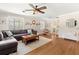 Elegant living room boasts hardwood floors, neutral color palette, and comfortable, modern furnishings at 1701 Canton Street, Orlando, FL 32803