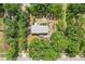 Aerial view of the property showing the house layout with greenery, and the surrounding neighborhood at 2229 N 6Th St, Orlando, FL 32820