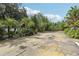 Open driveway surrounded by lush landscaping provides plenty of space for parking and outdoor activities at 2229 N 6Th St, Orlando, FL 32820