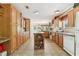 Bright kitchen featuring ample cabinet space, a central island, and modern appliances at 2229 N 6Th St, Orlando, FL 32820
