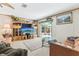 Cozy living room with sliding glass doors and beautiful outdoor views at 2229 N 6Th St, Orlando, FL 32820