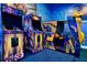 Amusement room showcasing modern arcade games with eye-catching themes and colorful designs for Gathering entertainment at 304 Muirfield Loop, Reunion, FL 34747