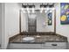 Bathroom vanity featuring a granite countertop, modern fixtures, and ample lighting at 304 Muirfield Loop, Reunion, FL 34747