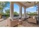 Outdoor patio with comfortable seating, perfect for enjoying the scenic views and fresh air at 304 Muirfield Loop, Reunion, FL 34747