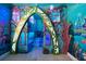 Unique playroom features an under the sea theme, complete with a custom arch and colorful aquatic decor at 304 Muirfield Loop, Reunion, FL 34747