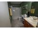 Full bathroom featuring tub with shower, decorative towels, and artwork at 3055 Leflore Ln, Orlando, FL 32833