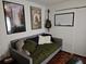 Comfortable bedroom with reading material and movie poster decorations at 3055 Leflore Ln, Orlando, FL 32833