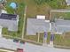 An aerial view of the home showcasing the layout, driveway, and proximity to neighbors at 3162 Little Sound Dr, Orlando, FL 32827