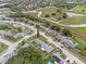 Overhead view of community, featuring tree-lined streets and manicured lawns at 3162 Little Sound Dr, Orlando, FL 32827