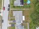 Aerial view of home showing roof, driveway, and surrounding neighborhood at 3162 Little Sound Dr, Orlando, FL 32827