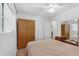 Bedroom with ceiling fan, neutral decor, closet and dresser at 3162 Little Sound Dr, Orlando, FL 32827