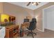 Bedroom or home office with computer desk, TV, lots of natural light at 3162 Little Sound Dr, Orlando, FL 32827