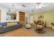 Cozy living room showcasing furniture, built in shelving, and natural light at 3162 Little Sound Dr, Orlando, FL 32827