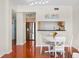 Inviting condo dining area connects to the kitchen, with hardwood floors and bright decor at 322 E Central Blvd # 1612, Orlando, FL 32801