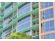 Modern building featuring curved balconies, expansive windows, and a unique architectural design at 322 E Central Blvd # 1612, Orlando, FL 32801