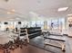 Spacious gym with dumbbell rack, weight machines, mirrors, and various workout equipment at 322 E Central Blvd # 1612, Orlando, FL 32801