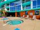 Relaxing hot tub with comfortable seating and views of the surrounding building at 322 E Central Blvd # 1612, Orlando, FL 32801