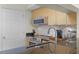 Condo kitchen features modern appliances, granite countertops, and custom cabinetry at 322 E Central Blvd # 1612, Orlando, FL 32801