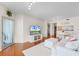 Cozy condo living area boasts hardwood floors, white furniture, and an open layout at 322 E Central Blvd # 1612, Orlando, FL 32801