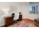 Cozy office space with a wooden desk, comfortable chair, and natural light at 322 E Central Blvd # 1612, Orlando, FL 32801