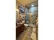 Bathroom with a walk-in shower that features neutral tile and a built-in bench at 3338 Robert Trent Jones Dr # 30704, Orlando, FL 32835
