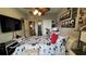 Cozy bedroom featuring unique decorations and a ceiling fan at 3338 Robert Trent Jones Dr # 30704, Orlando, FL 32835