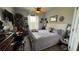 Bedroom with a ceiling fan, window, and light-colored walls and flooring at 3338 Robert Trent Jones Dr # 30704, Orlando, FL 32835