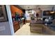 Kitchen with stainless steel appliances, a center island with barstool seating, and tile flooring at 3338 Robert Trent Jones Dr # 30704, Orlando, FL 32835