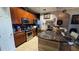 Well-lit kitchen featuring granite countertops and stainless steel appliances at 3338 Robert Trent Jones Dr # 30704, Orlando, FL 32835