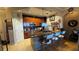 Kitchen featuring granite countertops, stainless appliances, and center island with barstool seating at 3338 Robert Trent Jones Dr # 30704, Orlando, FL 32835
