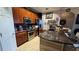 Modern kitchen features stainless steel appliances, granite countertops, and tile flooring at 3338 Robert Trent Jones Dr # 30704, Orlando, FL 32835