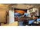 Well-lit kitchen featuring granite countertops and stainless steel appliances at 3338 Robert Trent Jones Dr # 30704, Orlando, FL 32835
