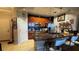Modern kitchen features stainless steel appliances, granite countertops, and tile flooring at 3338 Robert Trent Jones Dr # 30704, Orlando, FL 32835