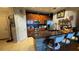 Well-equipped kitchen with stainless steel appliances and a breakfast bar with seating at 3338 Robert Trent Jones Dr # 30704, Orlando, FL 32835