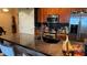 Close up of Kitchen island showcasing granite countertops, stainless steel sink and modern faucet at 3338 Robert Trent Jones Dr # 30704, Orlando, FL 32835