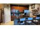 Well-equipped kitchen with stainless steel appliances and a breakfast bar with seating at 3338 Robert Trent Jones Dr # 30704, Orlando, FL 32835