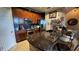 A contemporary kitchen featuring stainless steel appliances, wood cabinets and an eat-in island at 3338 Robert Trent Jones Dr # 30704, Orlando, FL 32835