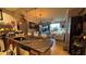 Open floor plan showcasing kitchen, with adjacent dining and living area providing ample space at 3338 Robert Trent Jones Dr # 30704, Orlando, FL 32835