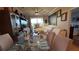 View of the living and dining areas, showcasing modern furniture and decor and creating a welcoming atmosphere at 3338 Robert Trent Jones Dr # 30704, Orlando, FL 32835