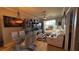 Bright open-concept living room, with a dining room and a view of the outside at 3338 Robert Trent Jones Dr # 30704, Orlando, FL 32835