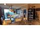Spacious living room showcasing modern lighting and an open floor plan at 3338 Robert Trent Jones Dr # 30704, Orlando, FL 32835