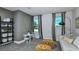 Cozy playroom with stylish decor, natural light, and comfortable seating at 3406 Haven Side Rd, Davenport, FL 33837
