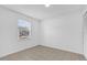Neutral bedroom with tile floors, a window with blinds, and a closet at 3685 Sunday Dr, Deltona, FL 32738