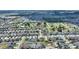 Aerial view showcases this home's position in a community with nearby amenities and well-maintained surroundings at 372 Willet St, Haines City, FL 33844