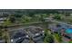 Aerial view of the home featuring solar panels on the roof and a spacious backyard at 372 Willet St, Haines City, FL 33844